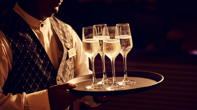 Waiter bringing drinks